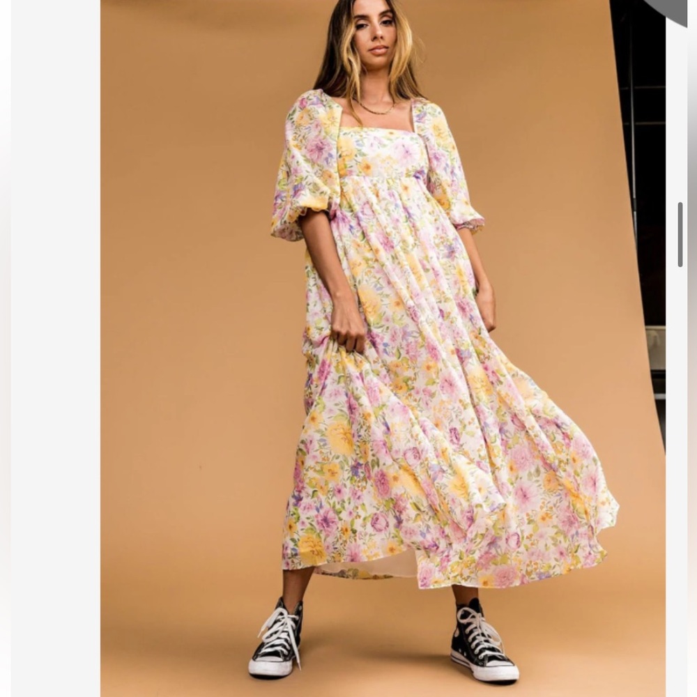 Dressed in Lala floral midi dress . Size small , never worn!